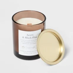 Clear Colored Glass With Woodwick And Brass Metal Inset Lid Acorn + Black Pine Candle Brown - Threshold™ -LumaHome GUEST e82cdb94 c293 4984 b5b6 1ca170680739